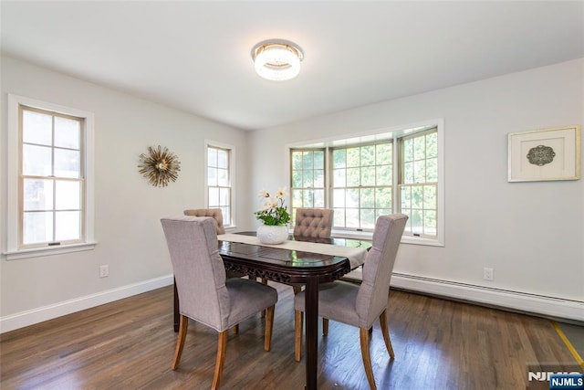 434 Argyle St, Oradell, NJ 07649 - dining room featuring baseboards and dark wood-type flooring