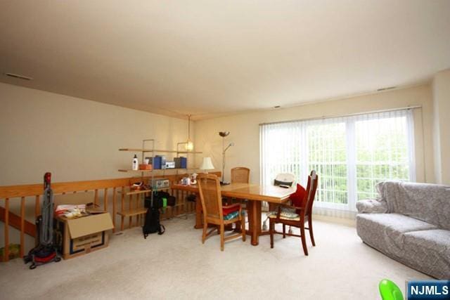 336 Village Ct Unit 3201, Fort Lee, NJ 07024 - dining space with carpet floors