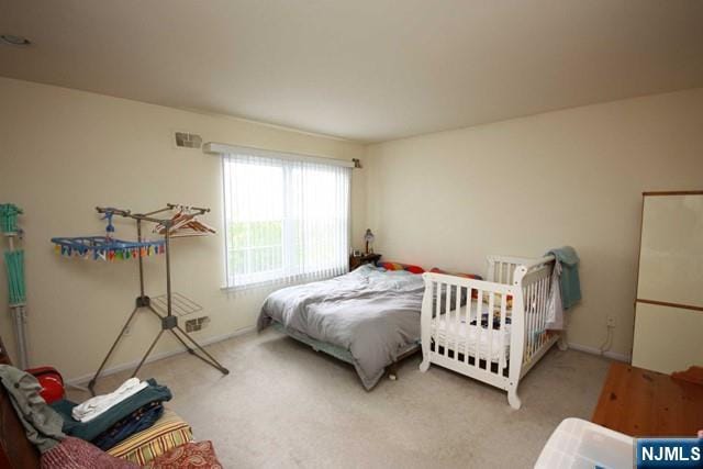336 Village Ct Unit 3201, Fort Lee, NJ 07024 - carpeted bedroom with baseboards