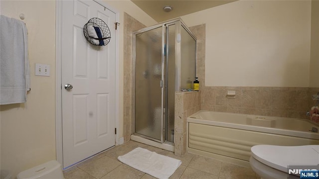 336 Village Ct Unit 3201, Fort Lee, NJ 07024 - bathroom featuring toilet, tile patterned floors, a garden tub, and a stall shower