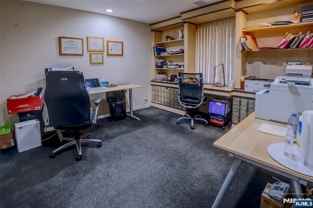 carpeted office featuring recessed lighting