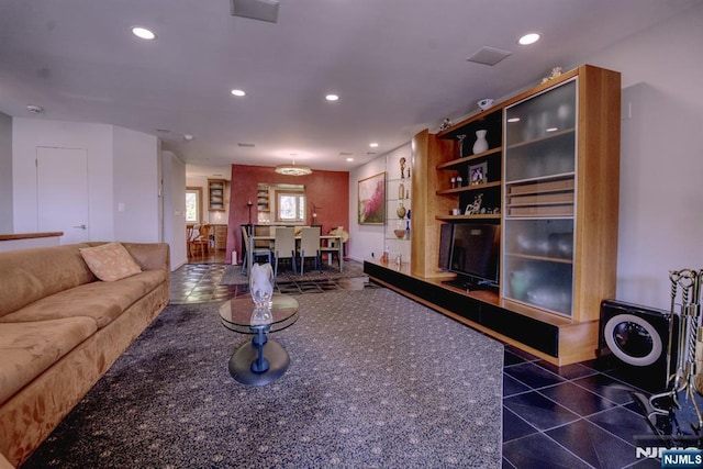 living area featuring recessed lighting