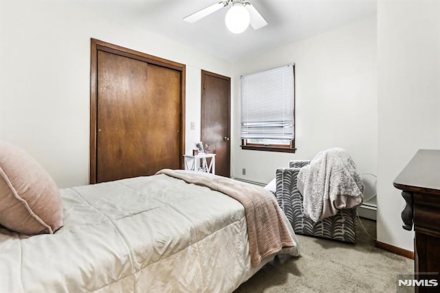 12-67 12th St, Fair Lawn, NJ 07410 - bedroom with baseboard heating, carpet floors, a baseboard radiator, ceiling fan, and baseboards