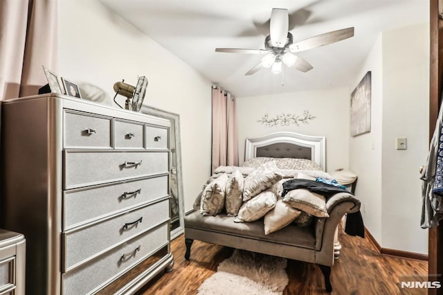 12-67 12th St, Fair Lawn, NJ 07410 - bedroom featuring dark wood-style floors, a ceiling fan, and baseboards