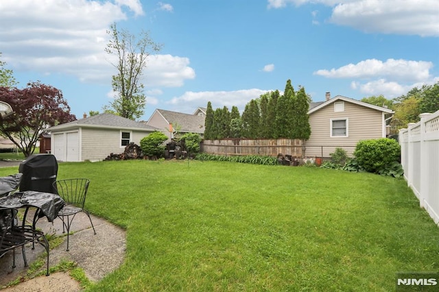 12-67 12th St, Fair Lawn, NJ 07410 - view of yard featuring a garage