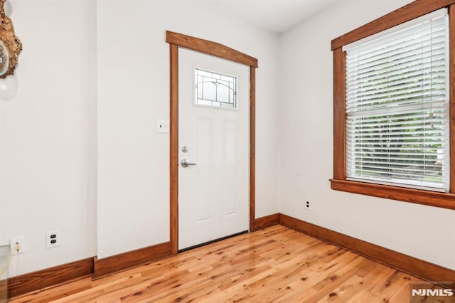 12-67 12th St, Fair Lawn, NJ 07410 - entryway featuring light wood-style flooring and baseboards