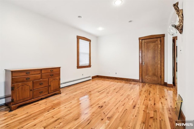 12-67 12th St, Fair Lawn, NJ 07410 - unfurnished room featuring baseboard heating, light wood finished floors, recessed lighting, and baseboards