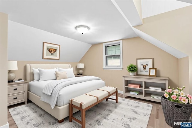 59 Harrison Ave, Saddle Brook, NJ 07663 - bedroom with light wood-style flooring and lofted ceiling
