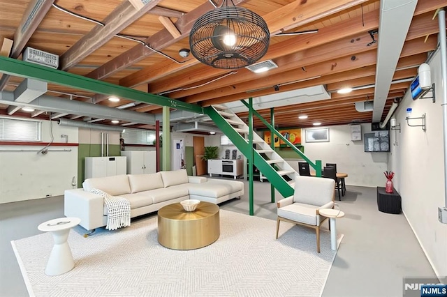 59 Harrison Ave, Saddle Brook, NJ 07663 - living room with concrete floors and stairway