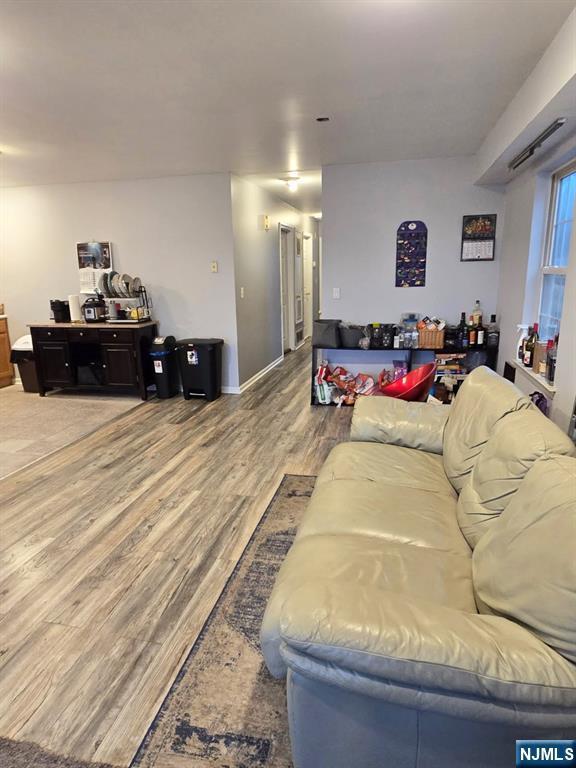 living room with wood finished floors