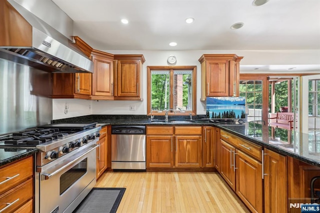 20 Old Farm Rd, Caldwell, NJ 07006 - kitchen with stainless steel appliances, extractor fan, a sink, brown cabinets, and recessed lighting