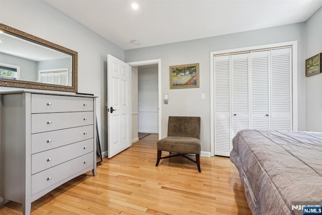 20 Old Farm Rd, Caldwell, NJ 07006 - bedroom with light wood-style flooring, a closet, and baseboards
