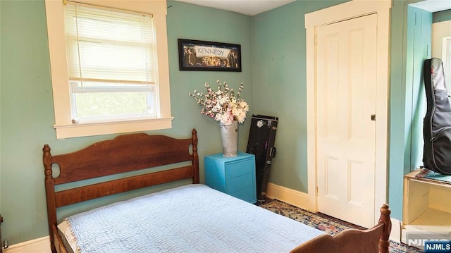 bedroom with baseboards