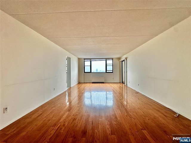 250 Gorge Unit 23A, Cliffside Park, NJ 07010 - spare room with wood finished floors and baseboards