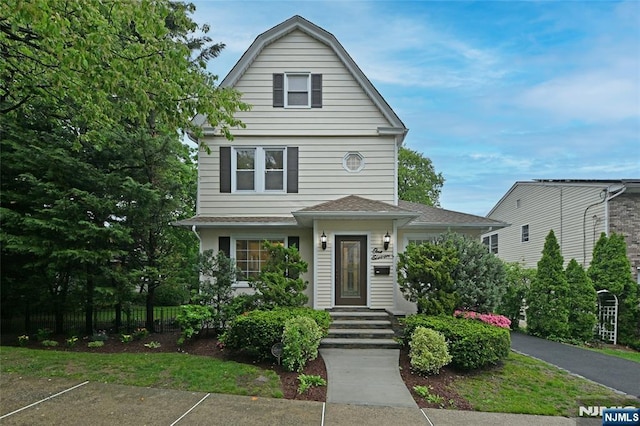 view of front of home with fence