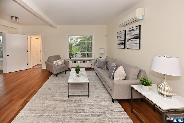 living room featuring radiator, a wall mounted AC, and wood finished floors