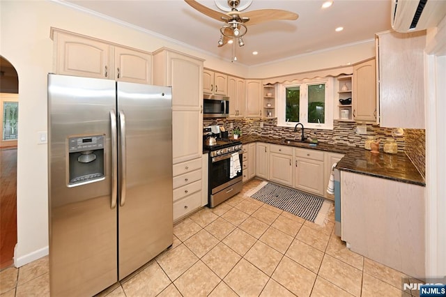 kitchen with appliances with stainless steel finishes, open shelves, a wall mounted air conditioner, a sink, and ceiling fan