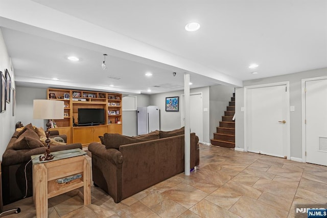 living room featuring recessed lighting, stairs, and light stone finish floors