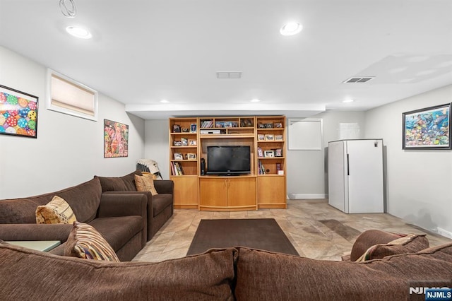 living room with recessed lighting