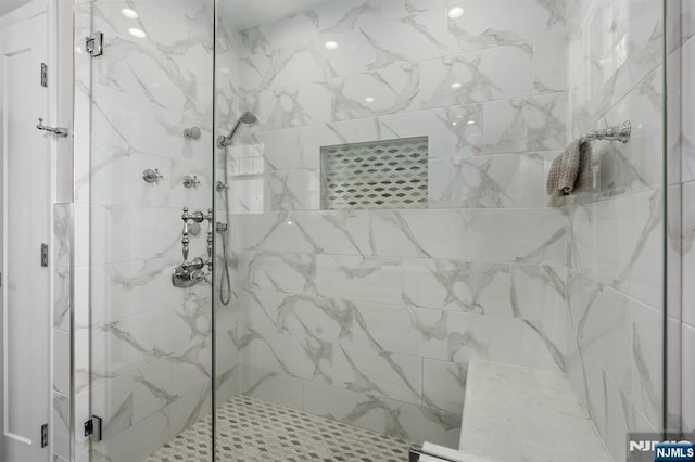 bathroom featuring a stall shower