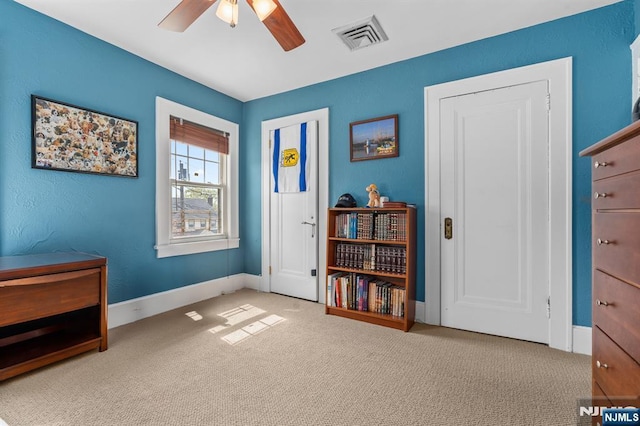 bedroom with carpet flooring, baseboards, and a ceiling fan