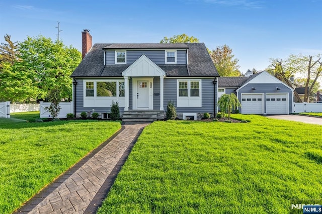 bungalow featuring a chimney, concrete driveway, an outdoor structure, a garage, and roof with shingles