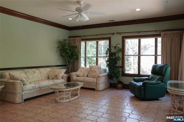 living room featuring crown molding, a ceiling fan, and recessed lighting
