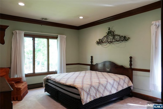 bedroom featuring ornamental molding, a baseboard radiator, multiple windows, recessed lighting, and light colored carpet