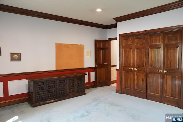 unfurnished bedroom featuring crown molding, carpet floors, a closet, and recessed lighting