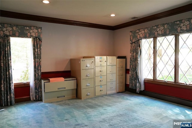 unfurnished bedroom with crown molding, multiple windows, carpet flooring, and recessed lighting