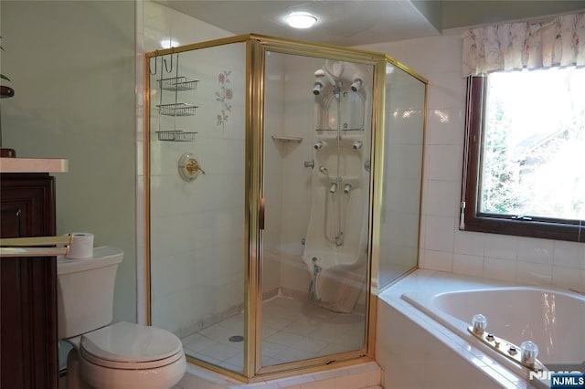 full bath with a bath, a stall shower, and toilet