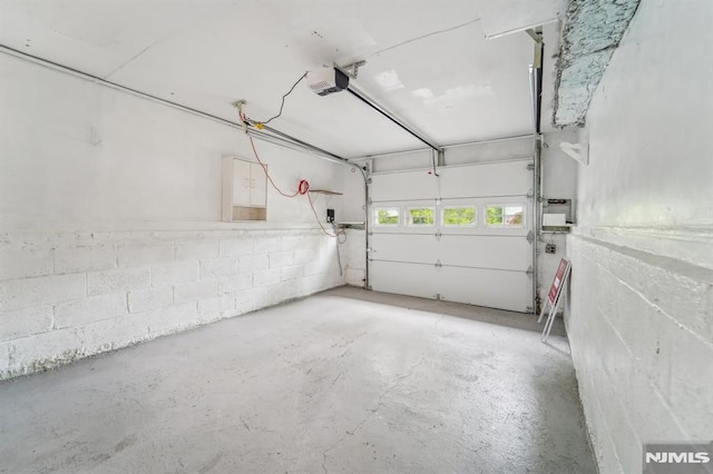 7 Swan Ter, Wayne, NJ 07470 - garage featuring a garage door opener