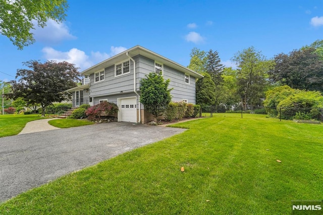 7 Swan Ter, Wayne, NJ 07470 - view of property exterior featuring driveway and a garage