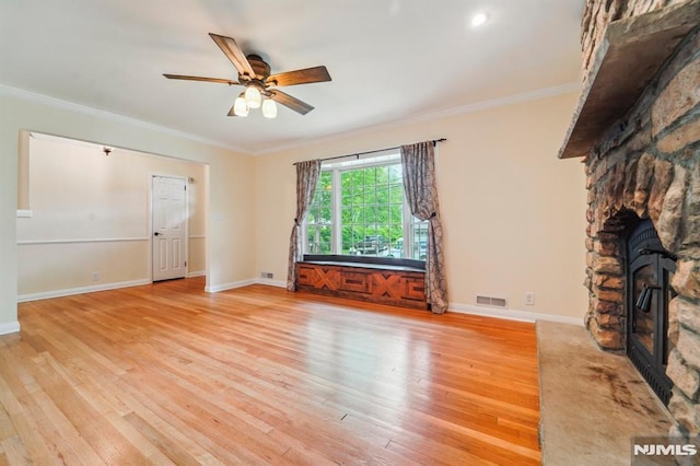 7 Swan Ter, Wayne, NJ 07470 - unfurnished living room with ceiling fan, ornamental molding, light wood-style floors, and baseboards