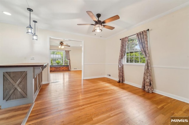 7 Swan Ter, Wayne, NJ 07470 - unfurnished room with ceiling fan, light wood finished floors, baseboards, and crown molding
