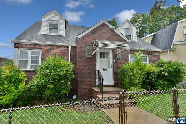 360 Kennedy Dr, Fairview, NJ 07022 - new england style home featuring brick siding and a shingled roof
