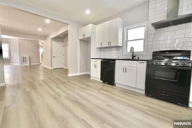 kitchen featuring black appliances, wall chimney exhaust hood, dark countertops, recessed lighting, and backsplash