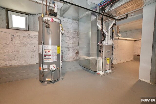 utilities featuring gas water heater and heating unit