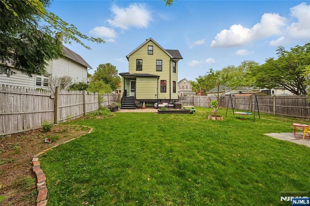 51 Maple St, Rutherford, NJ 07070 - back of house with an outdoor living space and a patio