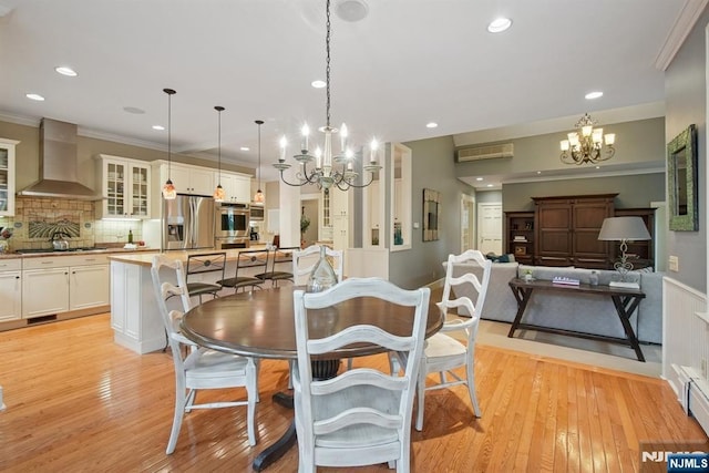 125 Bellevue Ave, Montclair, NJ 07043 - dining room featuring a chandelier, crown molding, light wood finished floors, and recessed lighting