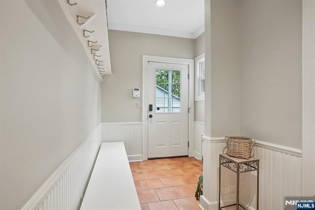 125 Bellevue Ave, Montclair, NJ 07043 - doorway with a wainscoted wall, crown molding, and light tile patterned floors