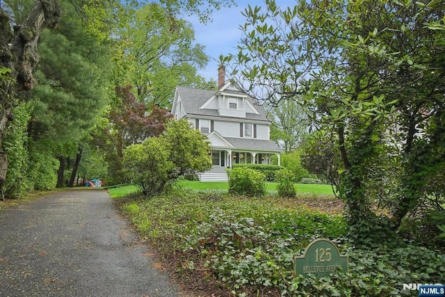 125 Bellevue Ave, Montclair, NJ 07043 - victorian-style house featuring a chimney and driveway