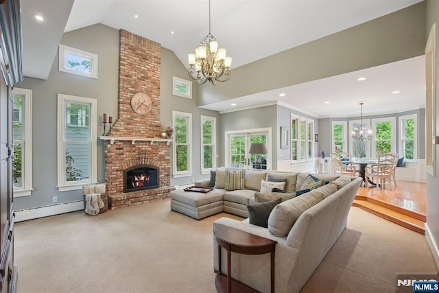 125 Bellevue Ave, Montclair, NJ 07043 - living area featuring a chandelier, a baseboard radiator, high vaulted ceiling, a brick fireplace, and recessed lighting