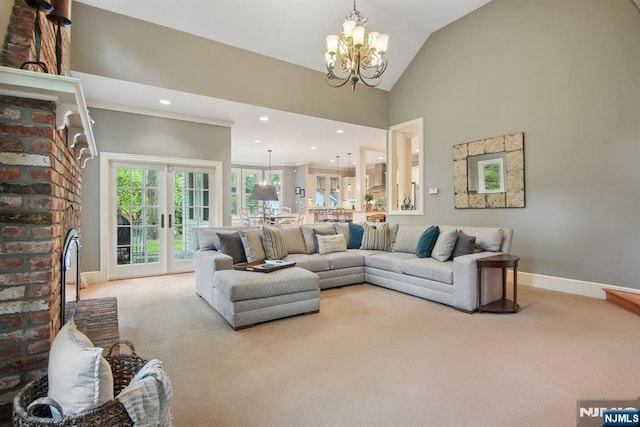 125 Bellevue Ave, Montclair, NJ 07043 - carpeted living room featuring a chandelier, french doors, baseboards, lofted ceiling, and recessed lighting