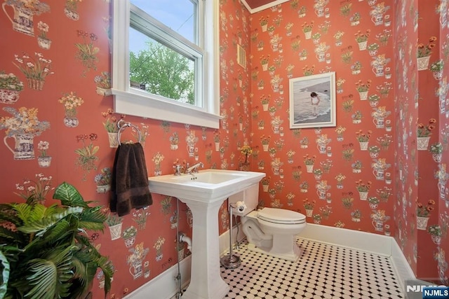 125 Bellevue Ave, Montclair, NJ 07043 - half bathroom featuring baseboards, toilet, wallpapered walls, and tile patterned floors