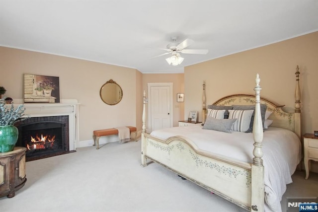 125 Bellevue Ave, Montclair, NJ 07043 - bedroom with a fireplace with flush hearth, carpet flooring, ceiling fan, ornamental molding, and baseboards