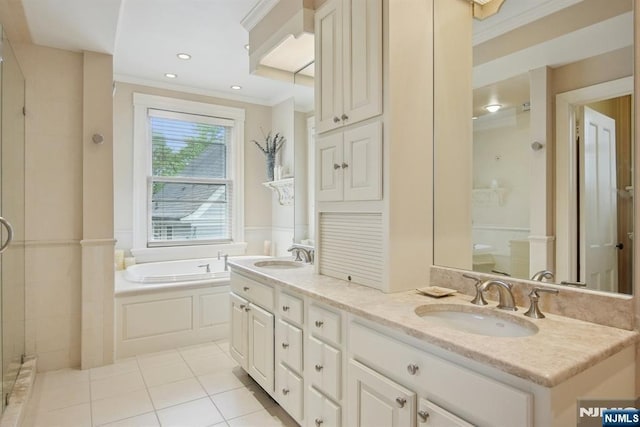 125 Bellevue Ave, Montclair, NJ 07043 - bathroom featuring ornamental molding, a shower stall, tile patterned flooring, a garden tub, and double vanity
