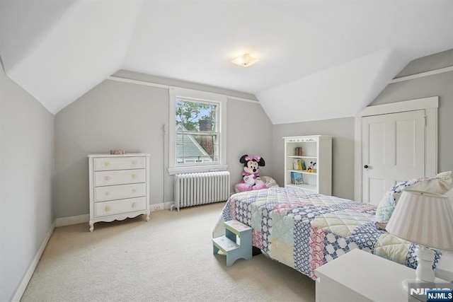 125 Bellevue Ave, Montclair, NJ 07043 - carpeted bedroom with radiator, lofted ceiling, and baseboards