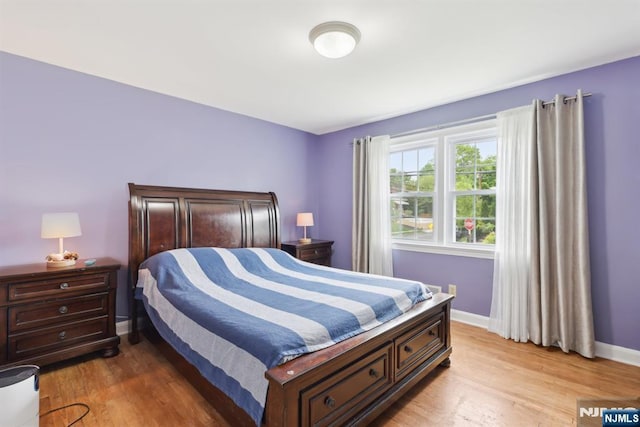 520 Elm St, Roselle Park, NJ 07204 - bedroom with light wood-style floors and baseboards