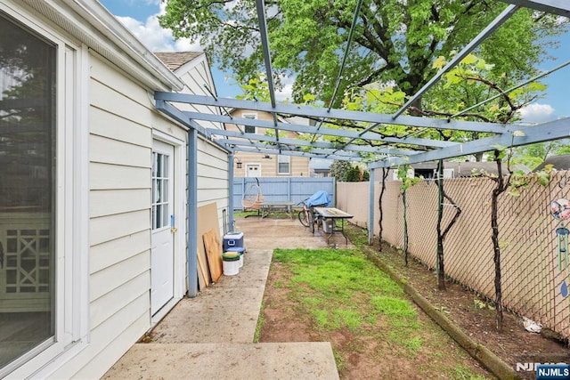 520 Elm St, Roselle Park, NJ 07204 - fenced backyard featuring a pergola and a patio area